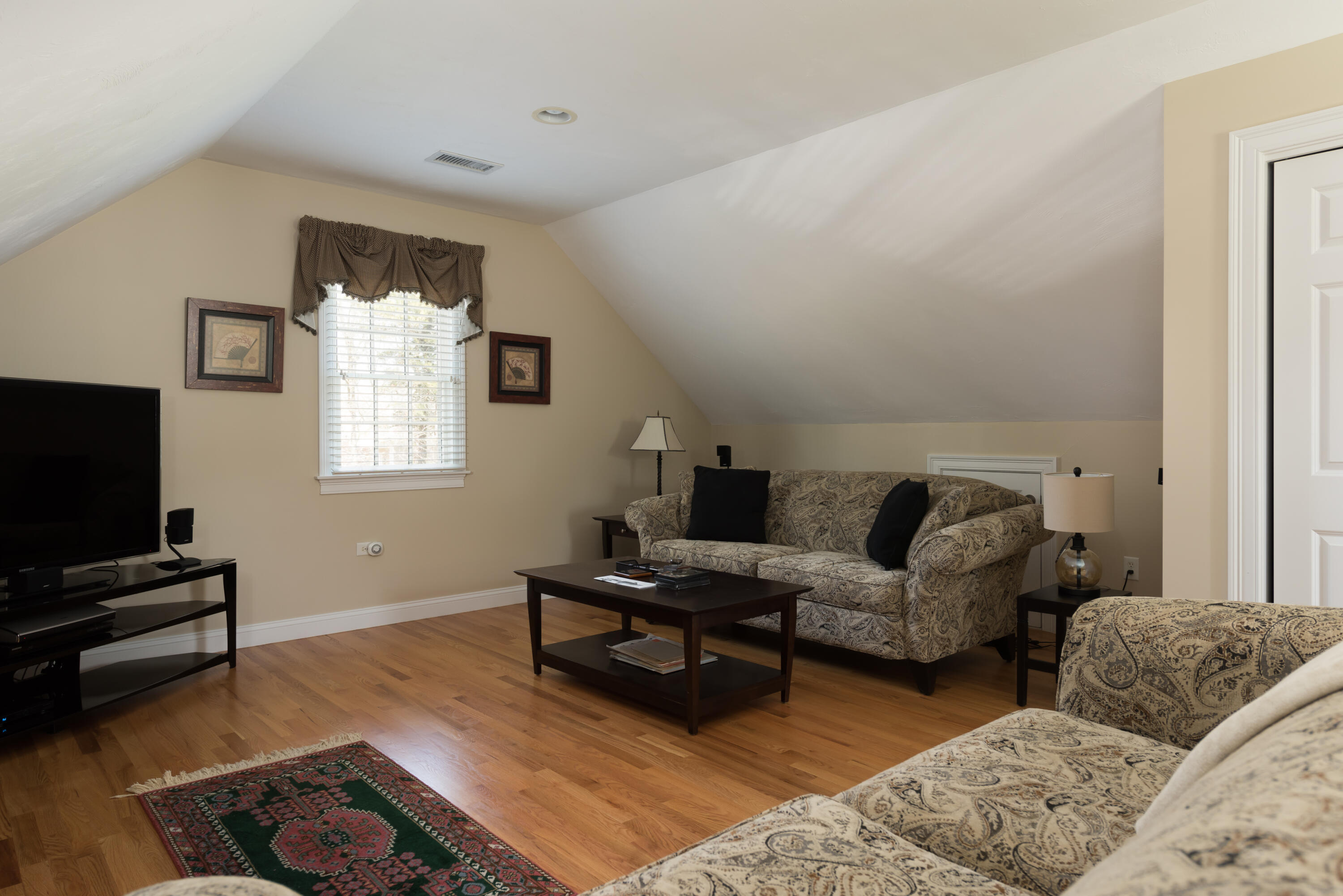 12 Somerset Road Harwich, MA 02645 - Photo 26 of 30 a living room with furniture and a flat screen tv