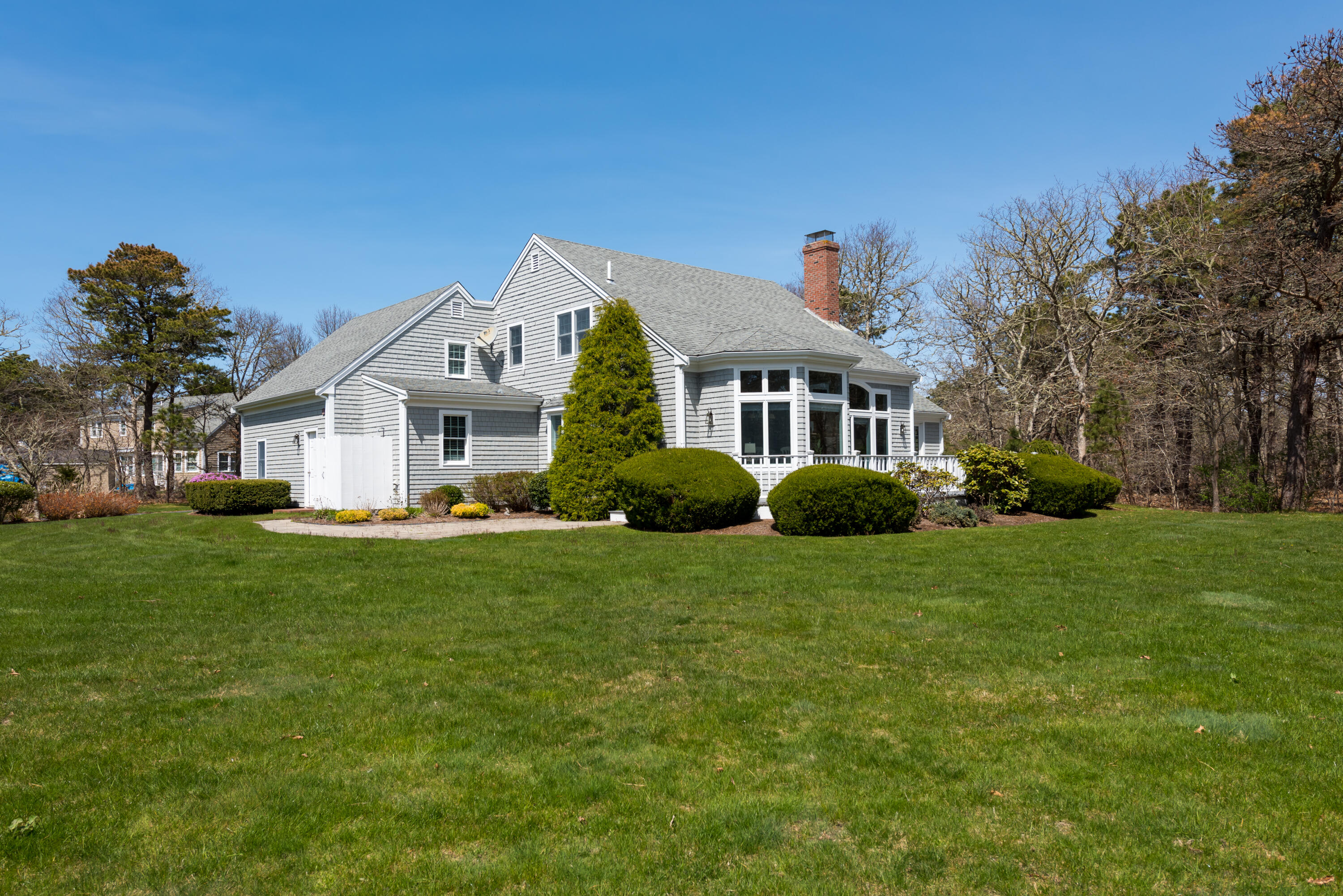 12 Somerset Road Harwich, MA 02645 - Photo 27 of 30 a front view of a house with a yard