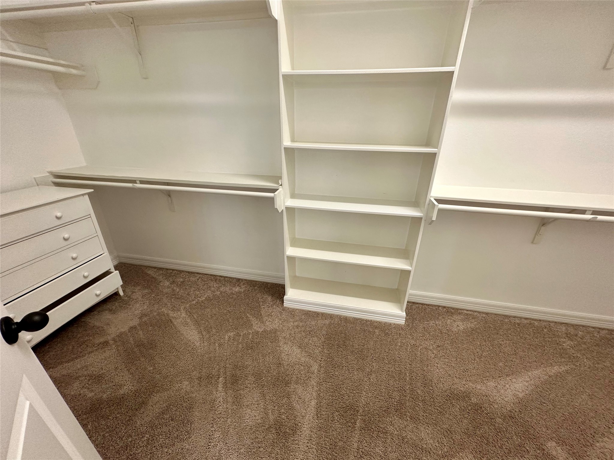 26507 Reflection Sky Court Katy, TX 77494 - Photo 13 of 24 a view of an empty walk in closet