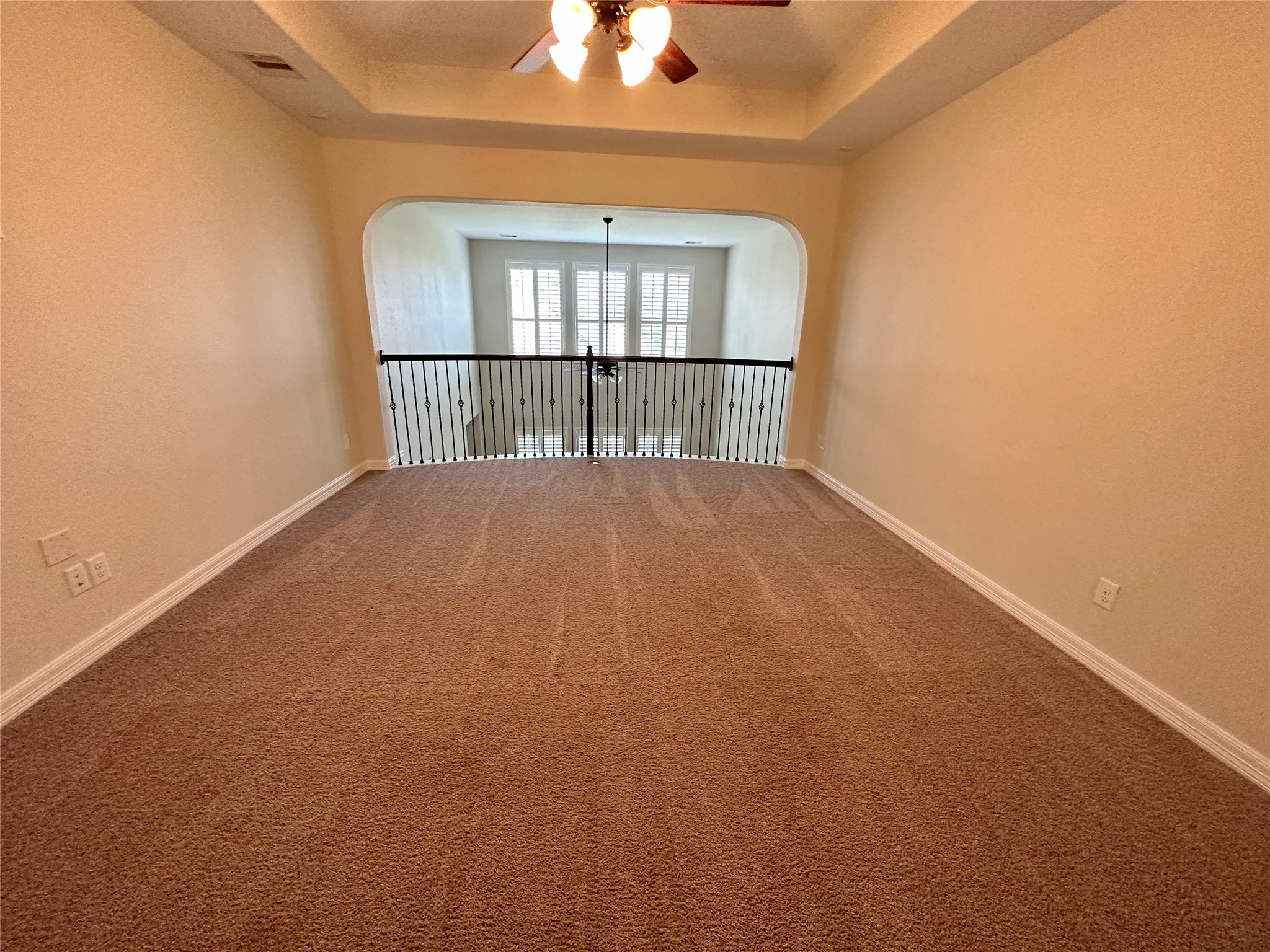 26507 Reflection Sky Court Katy, TX 77494 - Photo 16 of 24 an empty room with windows and view of an empty room