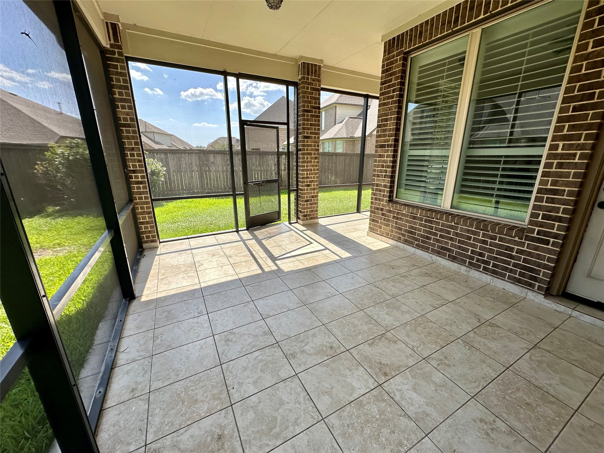 26507 Reflection Sky Court Katy, TX 77494 - Photo 22 of 24 a view of porch with a floor to ceiling window