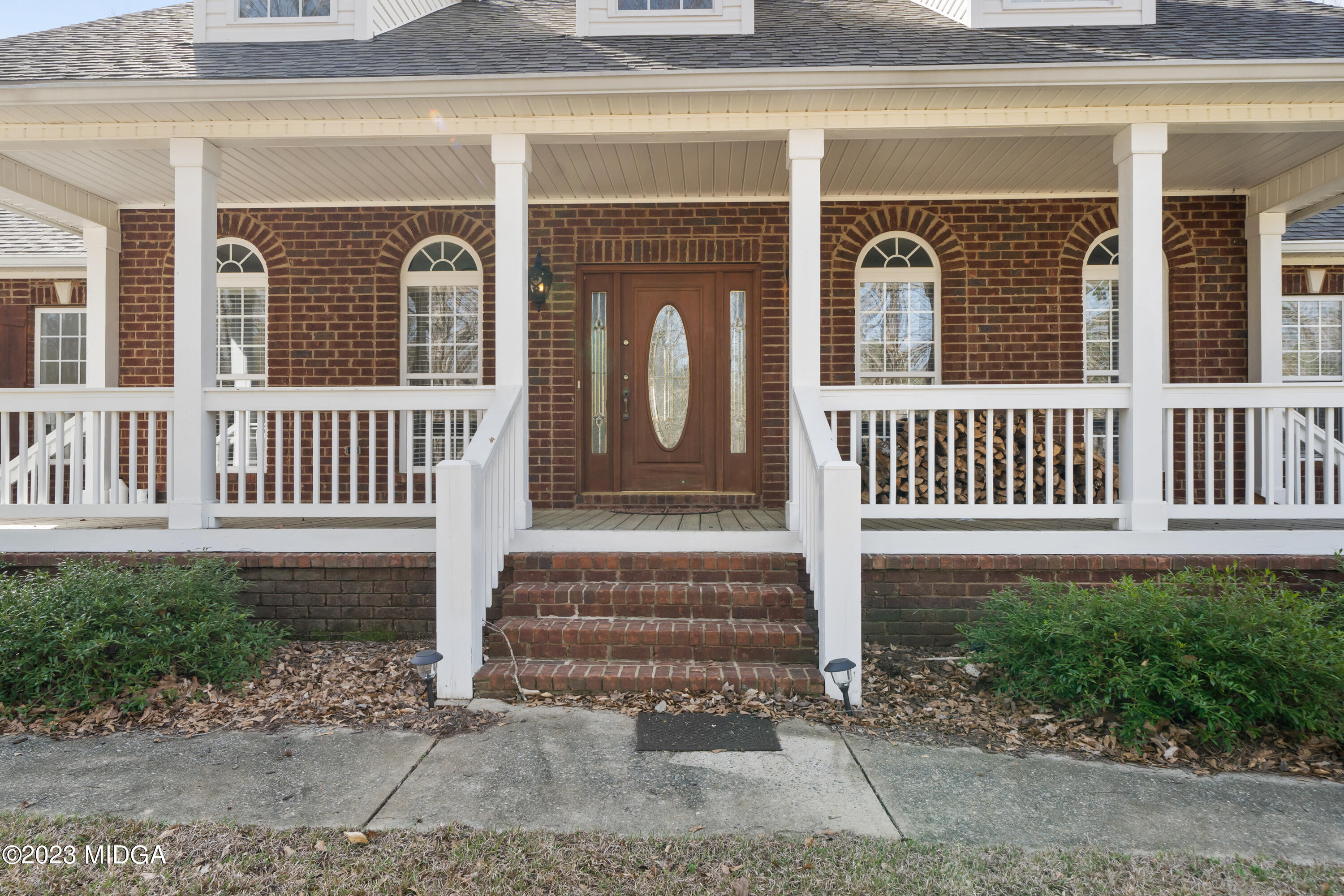 600 Flat Shoals Road Gray, GA 31032 - Photo 4 of 47 a front view of a house with a yard