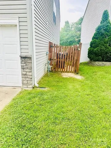 a view of a backyard with a garden