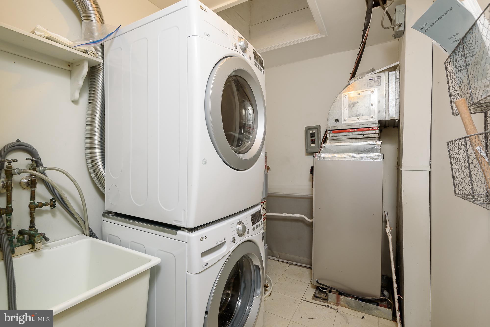 227 6th Street Northeast Washington, DC 20002 - Photo 23 of 30 Utility room off the hall with w/d and utilities