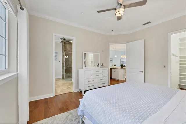 a bathroom with a double vanity sink mirror and toilet