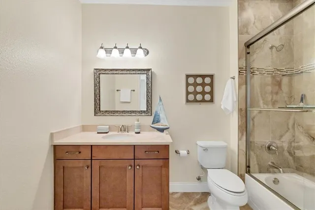 a view of a house with swimming pool and sitting area