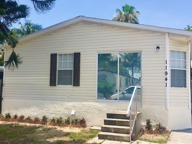 11941 Watergate Circle Boca Raton, FL 33428 - Photo 1 of 14 Front of Home