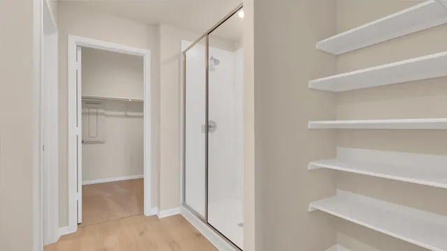 a view of an empty walk in closet