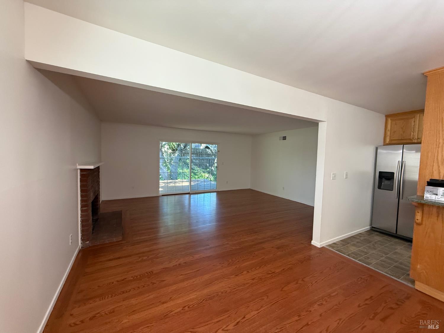 2553 Cactus Avenue Santa Rosa, CA 95405 - Photo 5 of 15 a view of a room with wooden floor and a window
