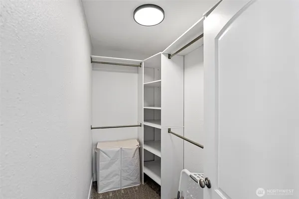 a view of an empty walk in closet