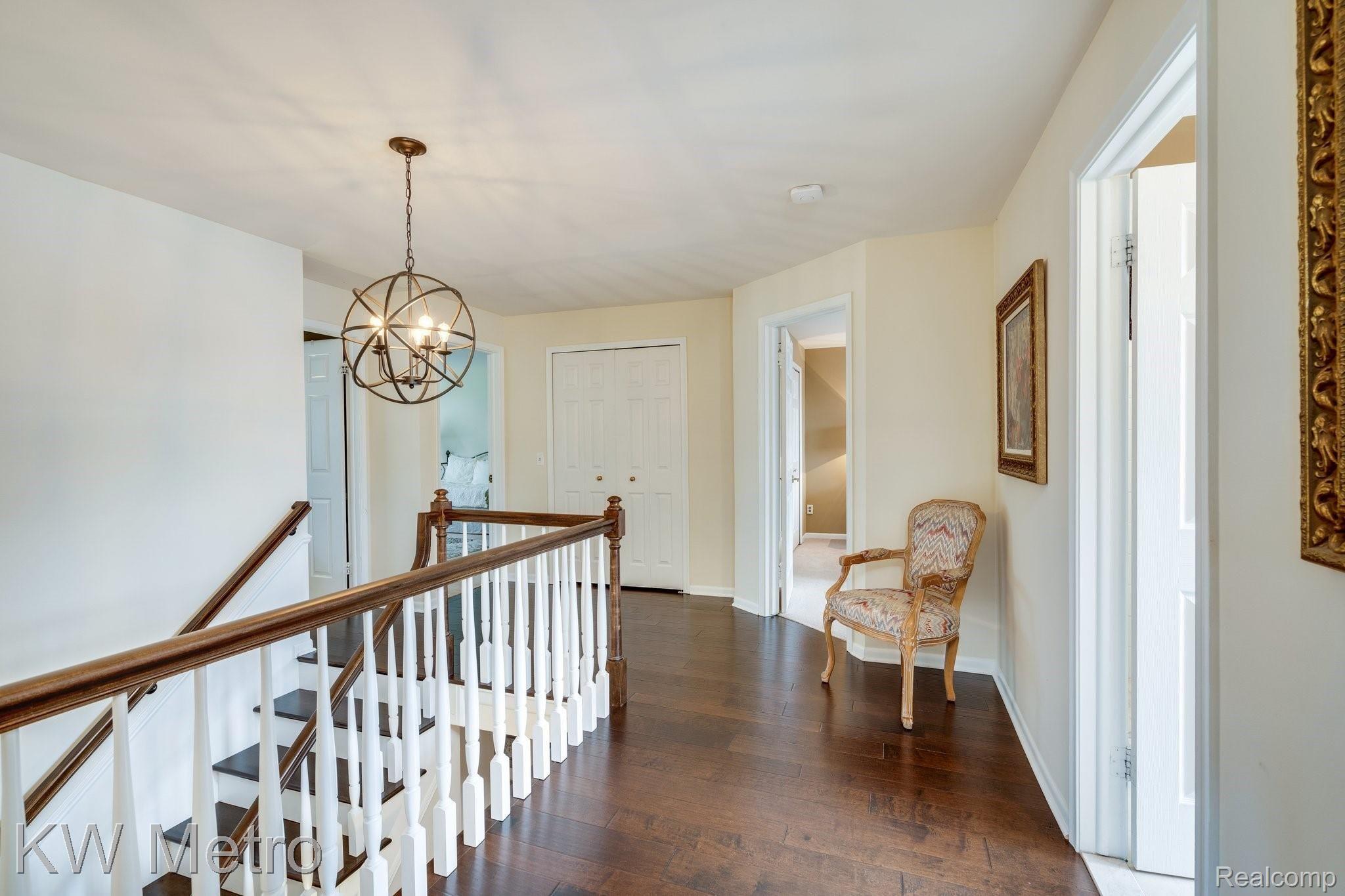 323 Shellbourne Drive Rochester, MI 48309 - Photo 28 of 62 Stunning hardwood through the upper hallway invites you to each of the bedrooms.