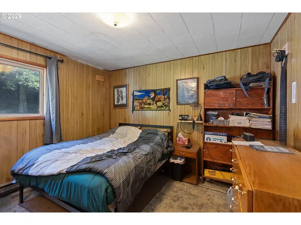 a bed room with a bed and furniture