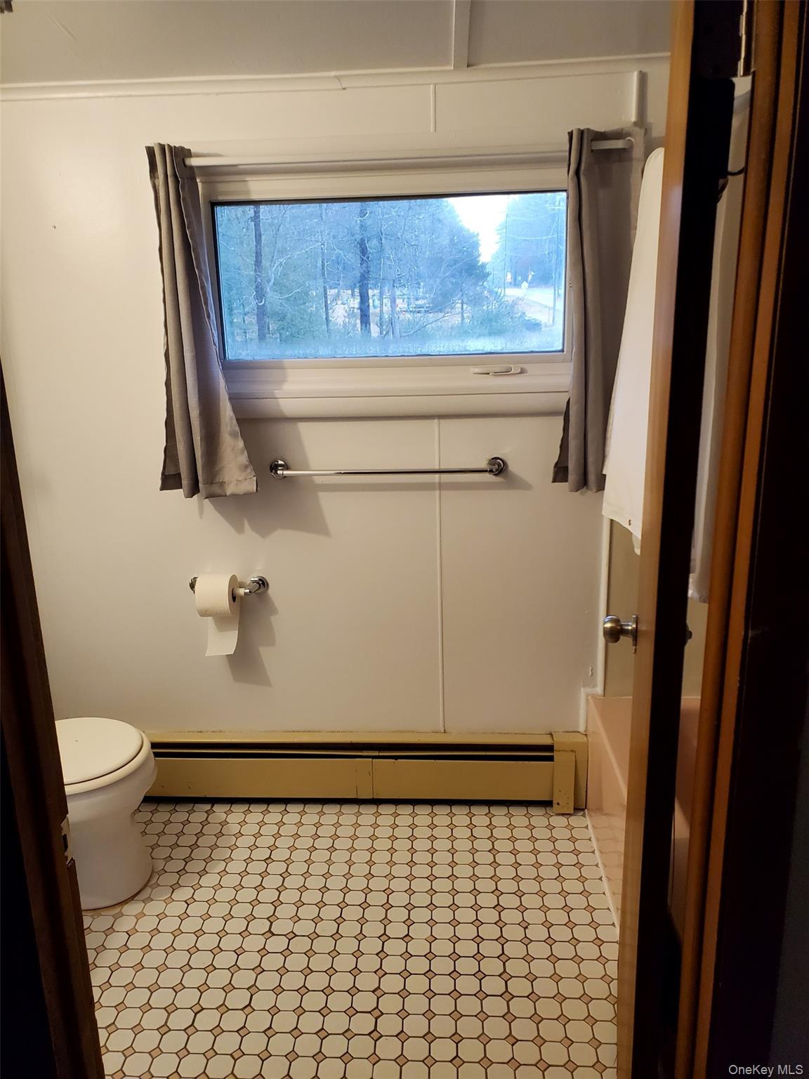 639 State Rte 55, Unit 2 Eldred, NY 12732 - Photo 7 of 11 a bathroom with a sink a toilet and a shower