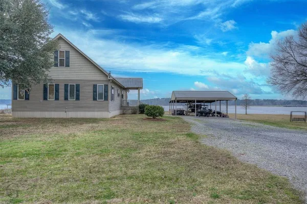 a house view with a garden space