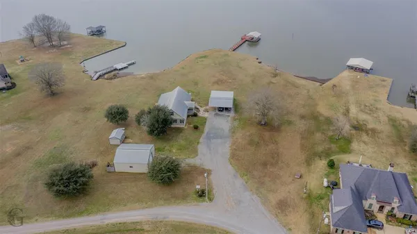 an aerial view of a highlighted house