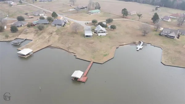 a close view of light fixtures and wooden floor
