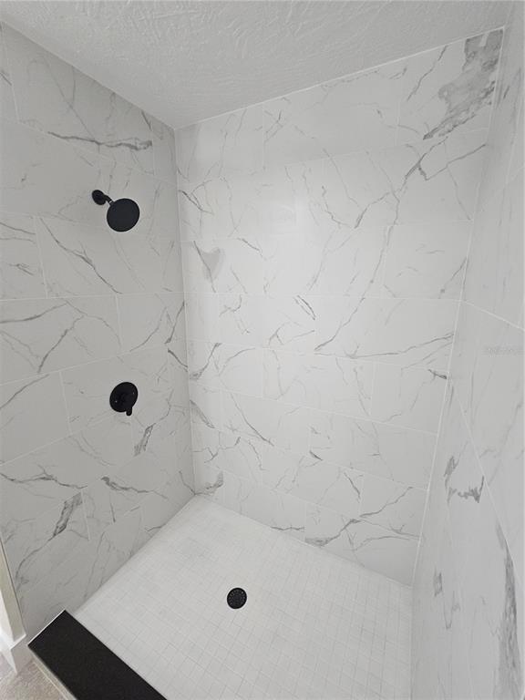 567 School Street Bronson, FL 32621 - Photo 20 of 23 a bathroom with a tub