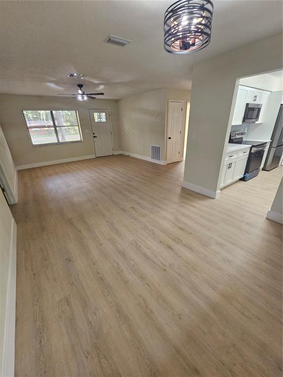 567 School Street Bronson, FL 32621 - Photo 7 of 23 a view of a hallway with a large window