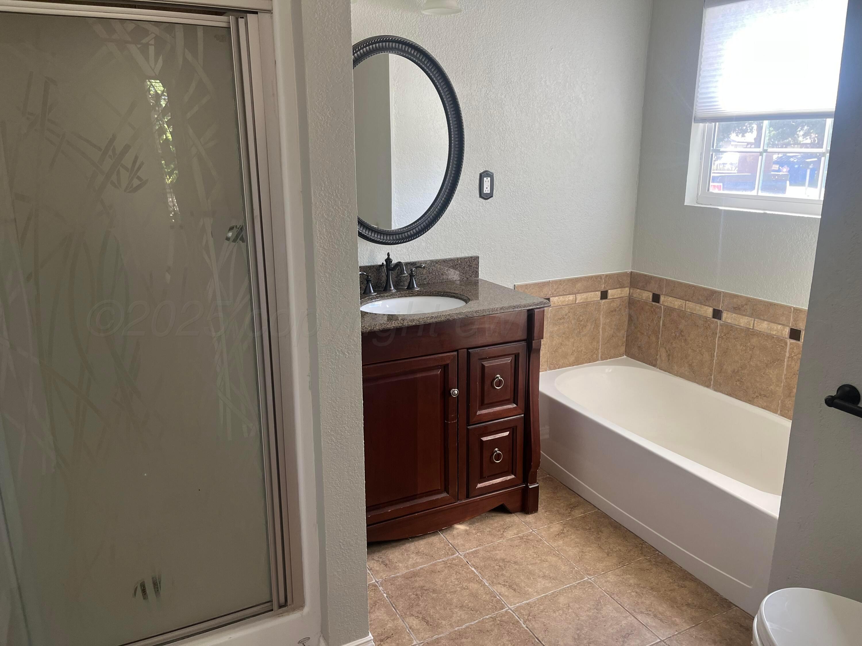 4515 Hines Road Amarillo, TX 79108 - Photo 13 of 26 Main Bathroom