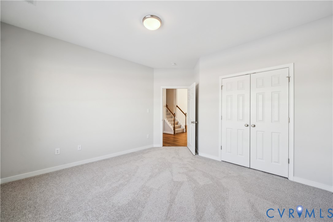 115 Logan Way Tappahannock, VA 22560 - Photo 13 of 29 a view of an empty room and window