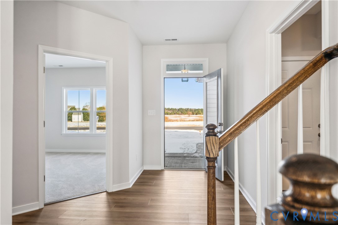 115 Logan Way Tappahannock, VA 22560 - Photo 16 of 29 a view of an entryway and wooden floor
