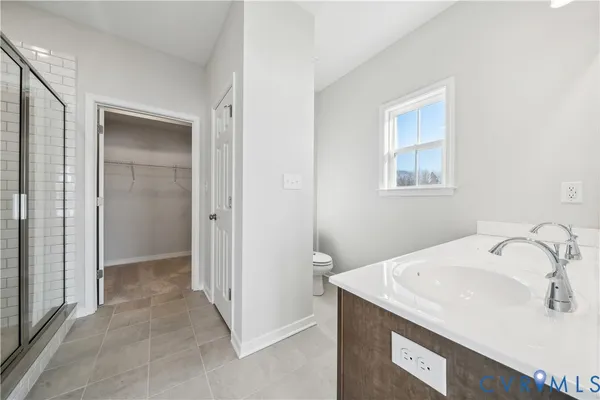 a bathroom with a sink and a shower