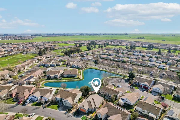 an aerial view of a city with lots of residential buildings