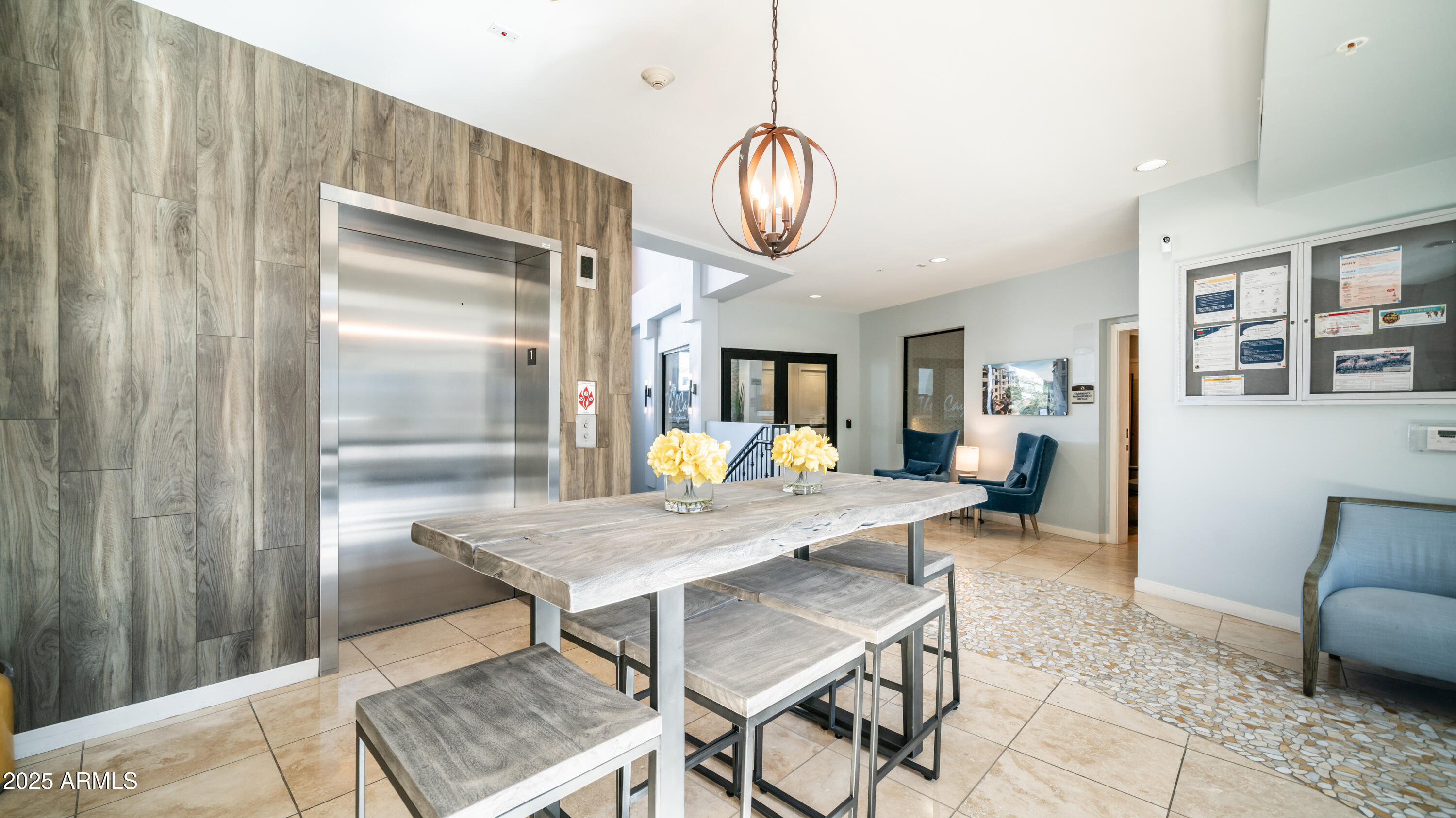 2511 West Queen Creek Road, Unit 166 Chandler, AZ 85248 - Photo 55 of 66 a view of a dining room with furniture window and wooden floor