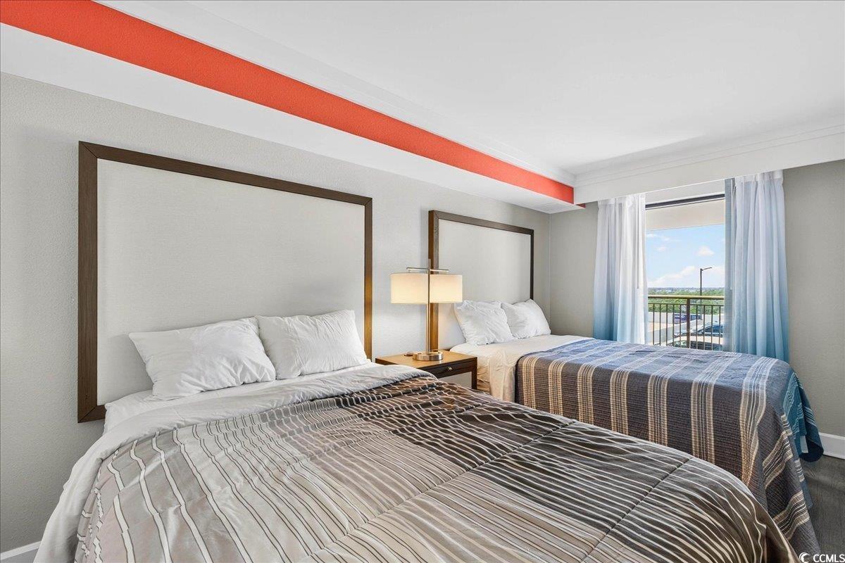 7200 North Ocean Boulevard, Unit 1155 Myrtle Beach, SC 29572 - Photo 17 of 40 Bedroom with baseboards