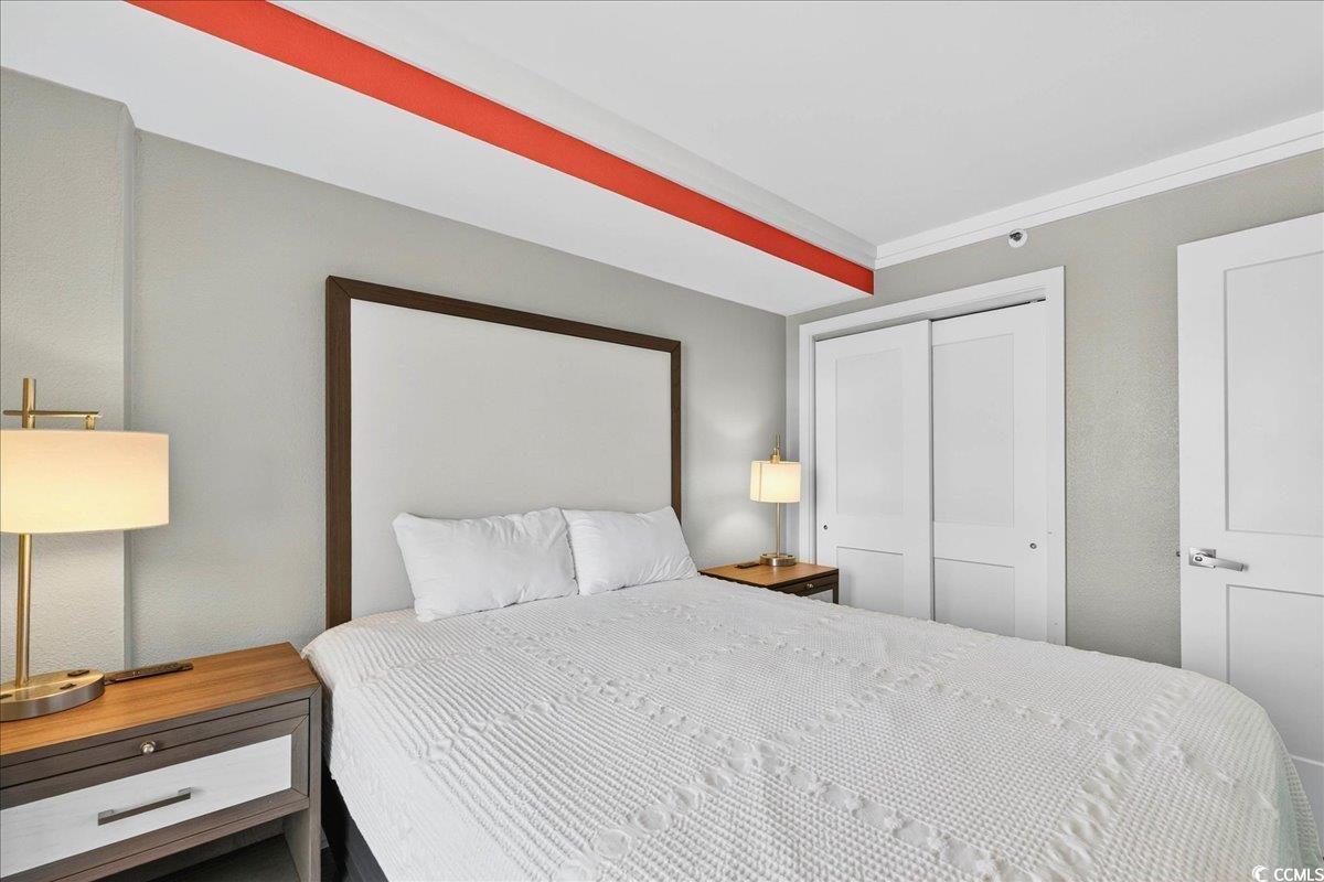 7200 North Ocean Boulevard, Unit 1155 Myrtle Beach, SC 29572 - Photo 22 of 40 Bedroom with a closet