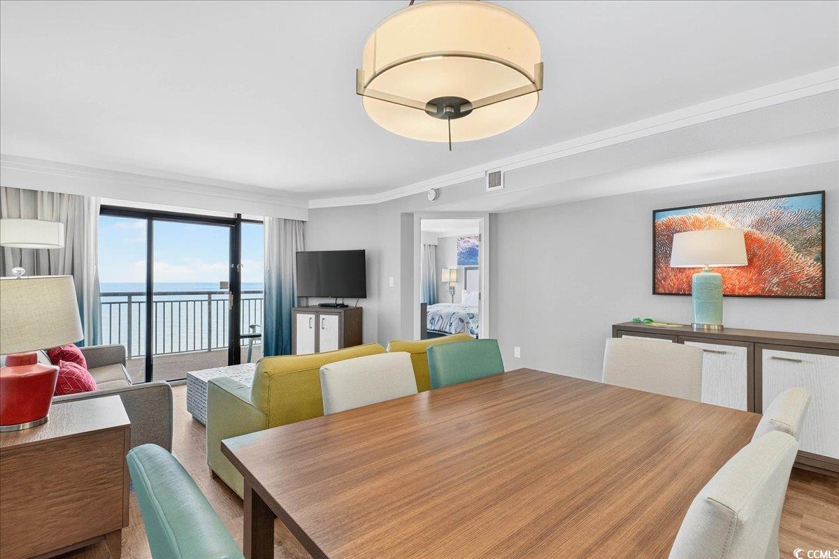 7200 North Ocean Boulevard, Unit 1155 Myrtle Beach, SC 29572 - Photo 31 of 40 Dining space with wood finished floors