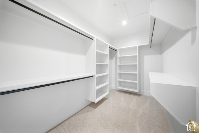 4092 Discovery Way Park City, UT 84098 - Photo 35 of 66 Custom white built-in shelving, multiple hanging rods, and integrated storage compartments