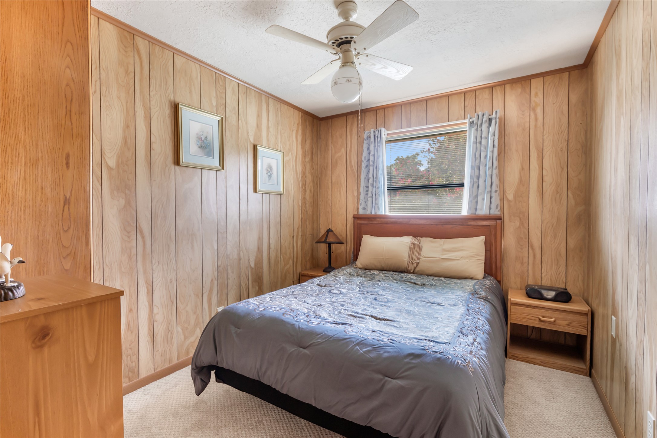 600 Sam Houston Loop Point Blank, TX 77364 - Photo 17 of 28 a bedroom with a large bed and a window