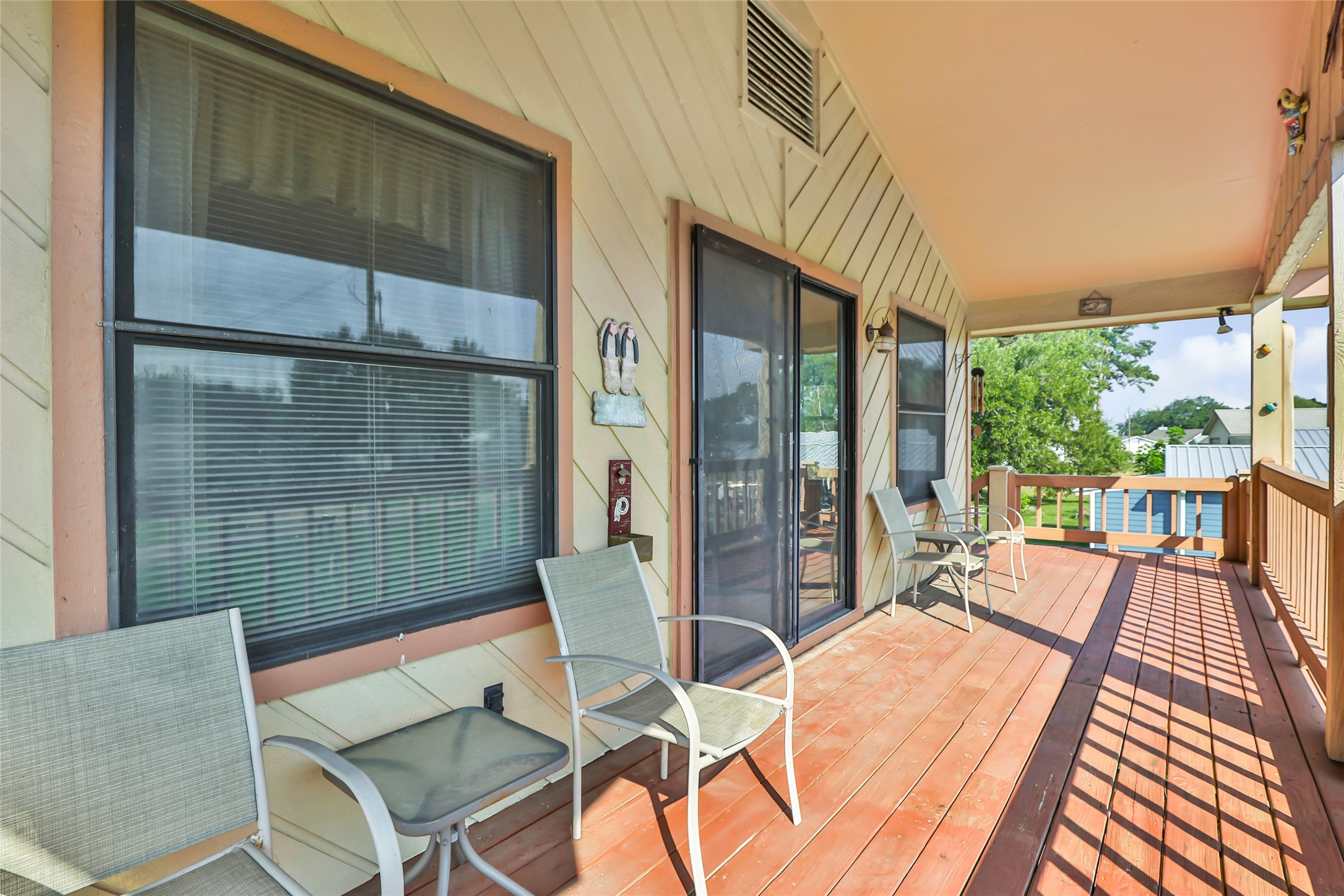 600 Sam Houston Loop Point Blank, TX 77364 - Photo 21 of 28 a balcony with chairs and glass door
