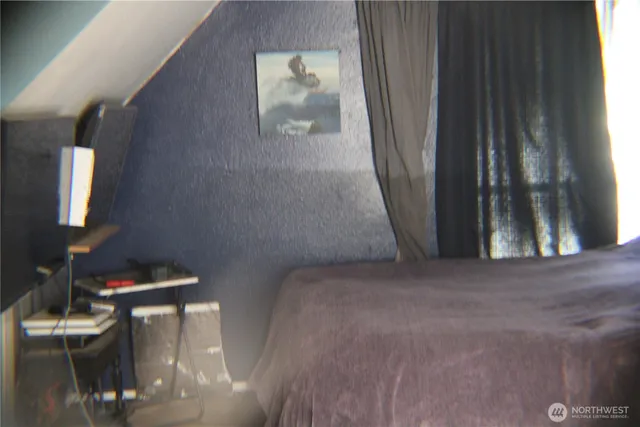 a bathroom with a toilet and a sink