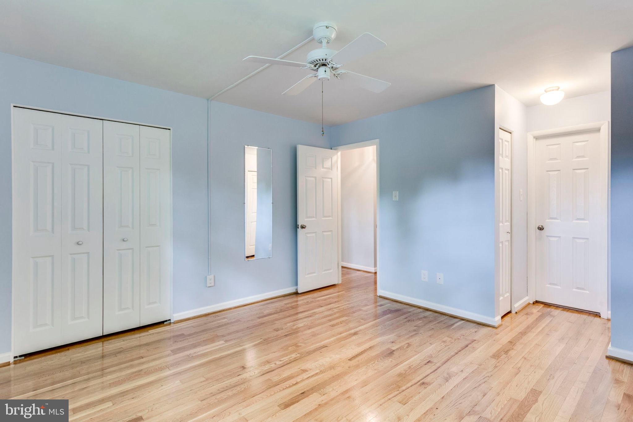 6016 Craft Road Alexandria, VA 22310 - Photo 16 of 32 a view of an empty room with wooden floor