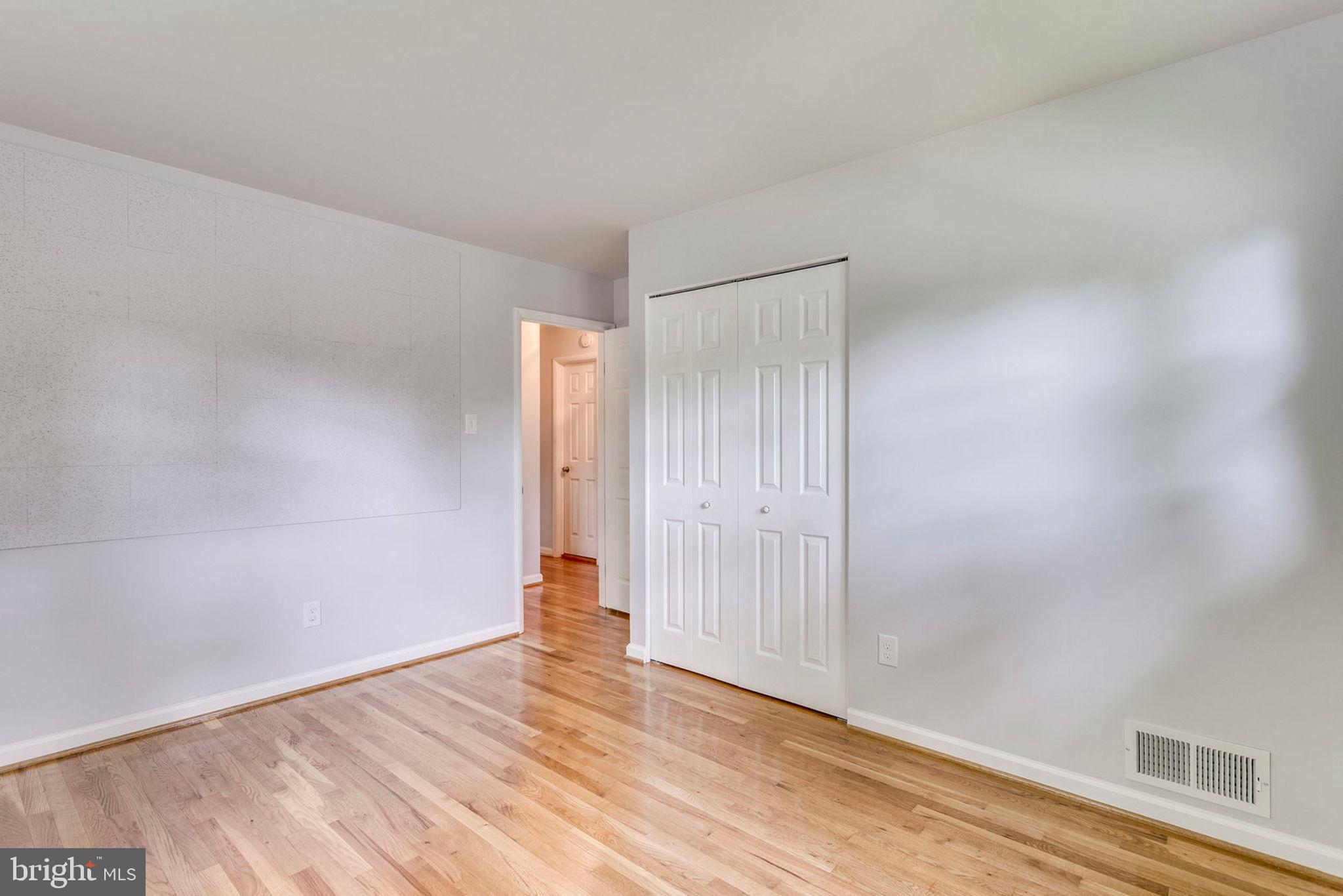6016 Craft Road Alexandria, VA 22310 - Photo 18 of 32 a view of an empty room and wooden floor