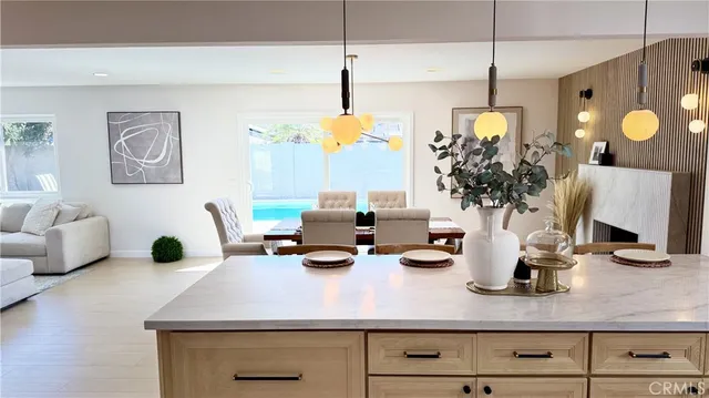 a kitchen with a sink cabinets and window