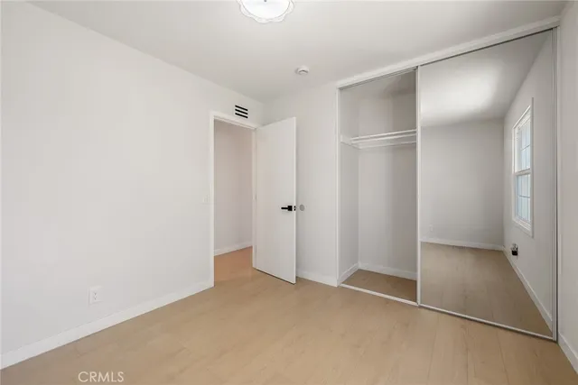 a bathroom with a sink a vanity and a mirror