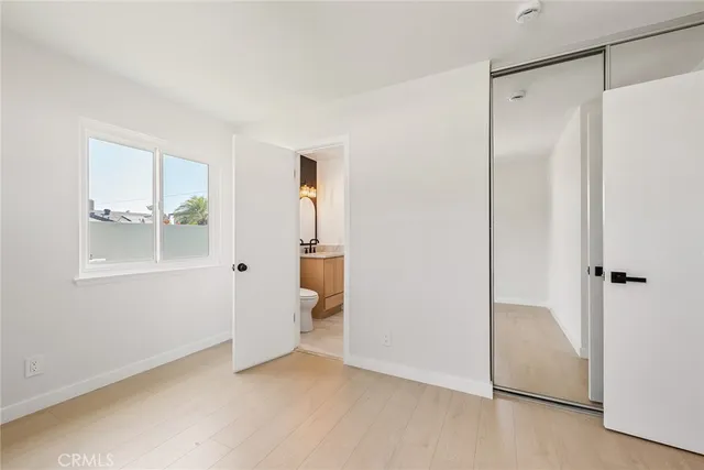 a bathroom with a shower and a toilet