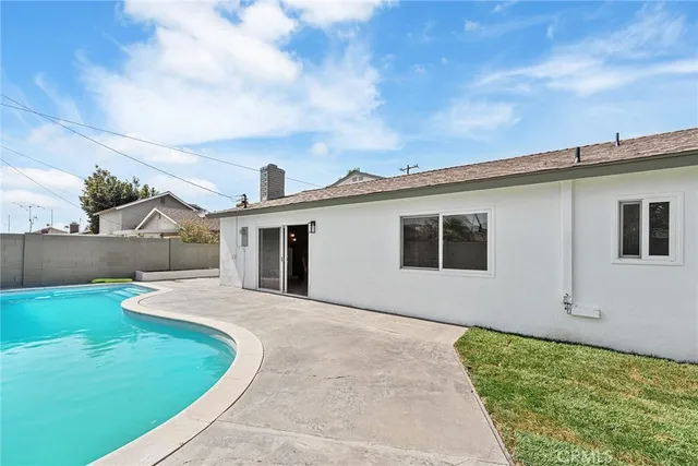 a utility room with sink dryer and washer