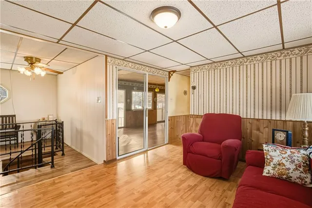 a outdoor living space with furniture and wooden floor