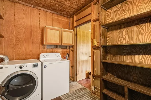 a utility room with dryer and washer