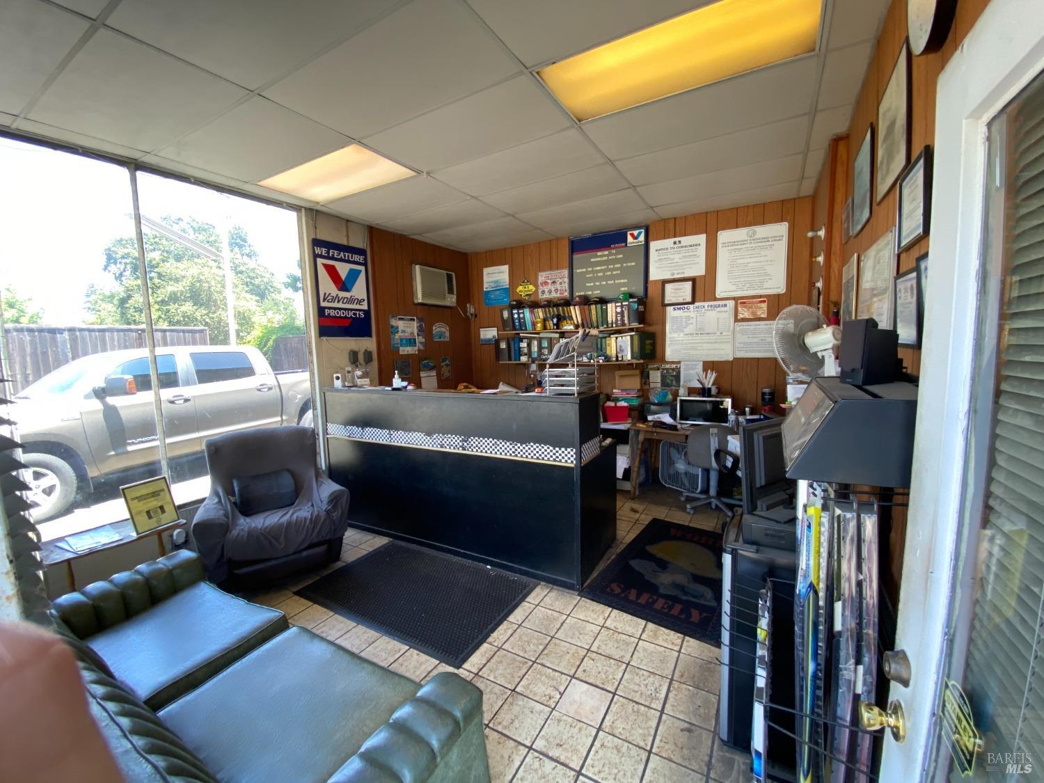 1680 Mendocino Avenue Santa Rosa, CA 95401 - Photo 8 of 8 a living room with furniture and a floor to ceiling window