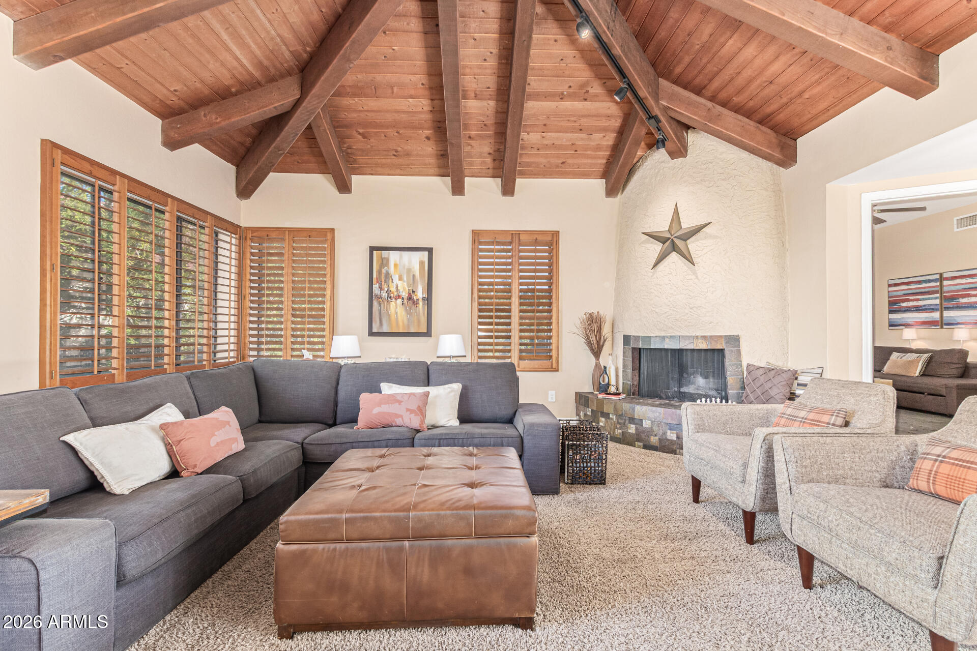 1932 East Beck Lane Phoenix, AZ 85022 - Photo 12 of 52 a living room with furniture and a large window