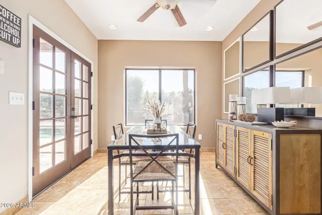 a view of walk in closet with clothes