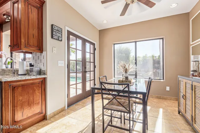 a bedroom with a bed dresser and a window