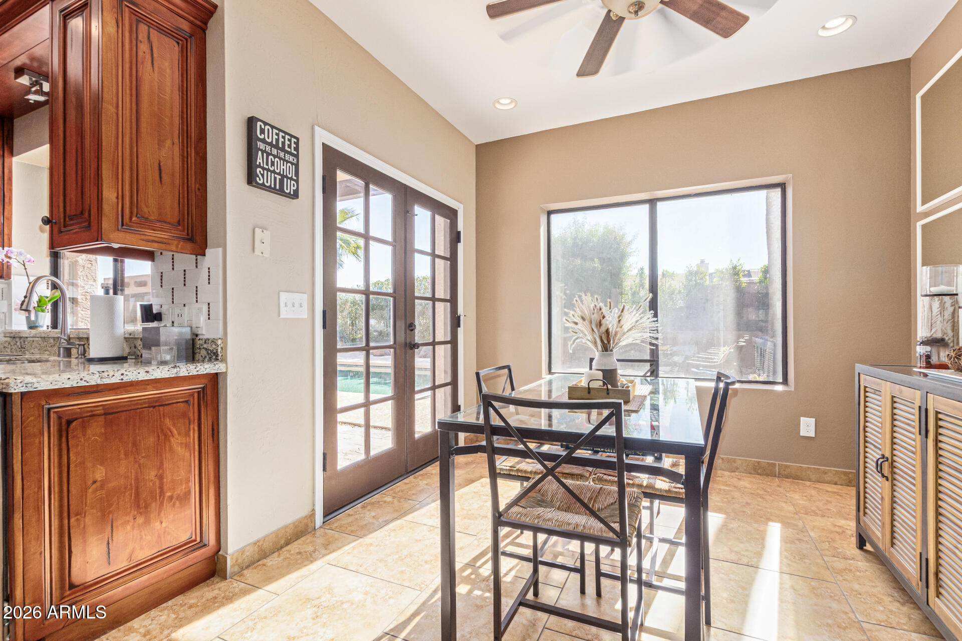 1932 East Beck Lane Phoenix, AZ 85022 - Photo 16 of 52 a view of a dining room with furniture window and outside view