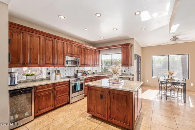 a bedroom with a bed and a desk