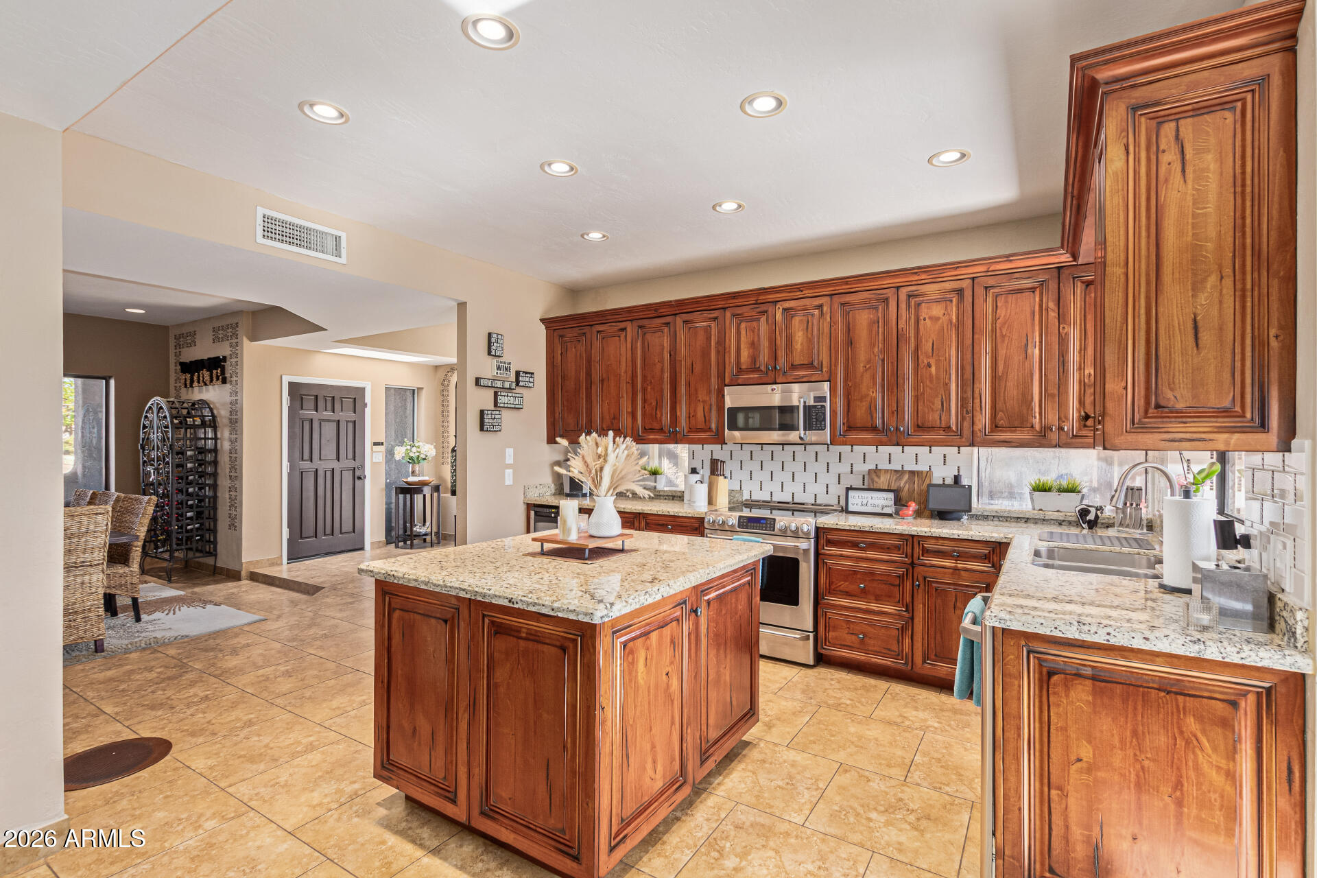 1932 East Beck Lane Phoenix, AZ 85022 - Photo 19 of 52 a kitchen with a sink stove and cabinets